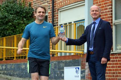 NNAB head of fundraising Jeremy Goss right cheers on Guy Gowing as he trains for the New York marathon