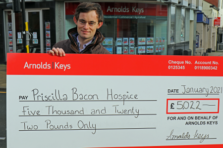 Nick Williams of Arnolds Keys with the Priscilla Bacon Hospice donation web3